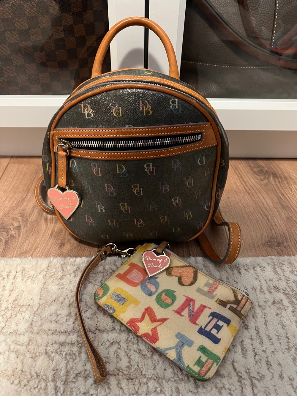 Vintage Dooney & Bourke Multicolor Signature Mini Backpack and pouch.